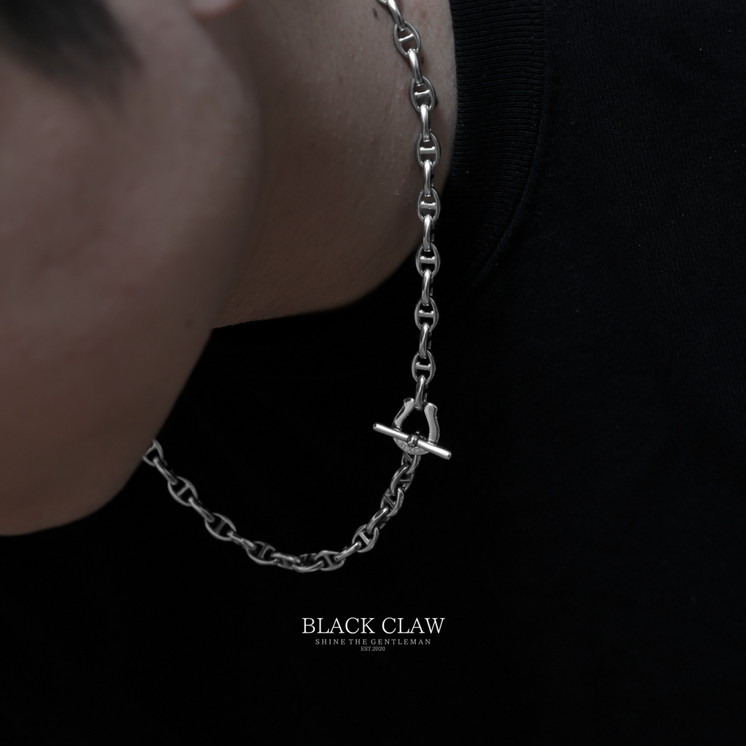 Worn on neck with toggle clasp